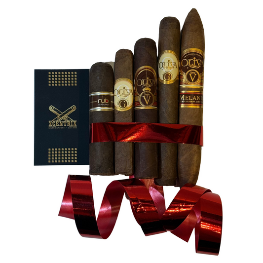 Assorted cigars with a red ribbon on a white background